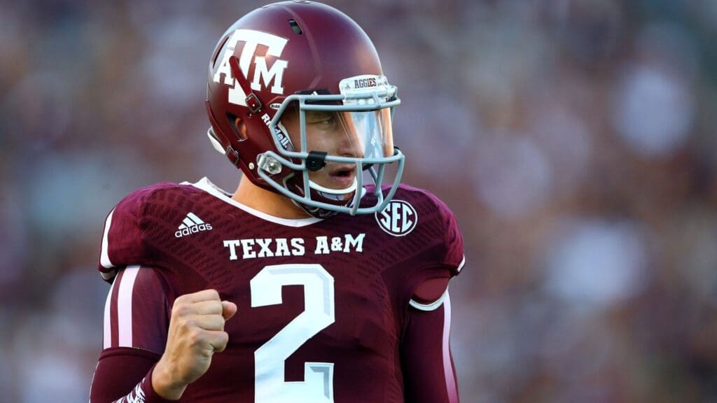 Sep 21, 2013; College Station, TX, USA; Texas A&M Aggies quarterback Johnny Manziel (2) celebrates a touchdown against the SMU Mustangs at Kyle Field.