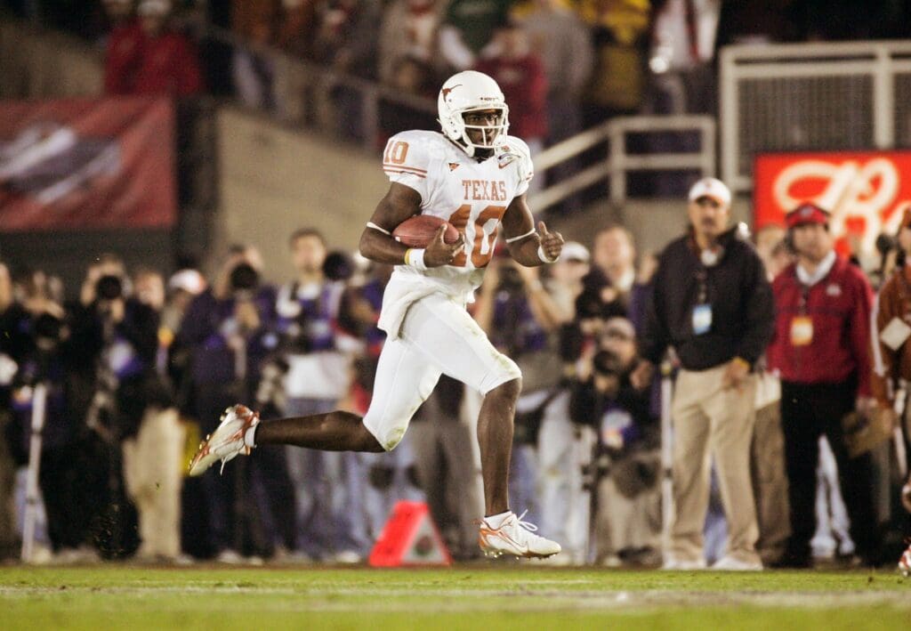 Jan 4, 2006; Pasadena, CA, USA: FILE PHOTO; Texas Longhorns quarterback Vince Young (10) in action against the Southern California Trojans during the 2006 Rose Bowl at the Rose Bowl. The Longhorns defeated the Trojans 41-38.