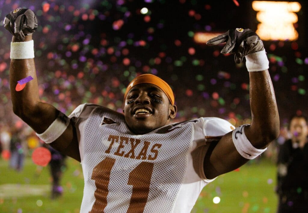 Jan 4, 2006; Pasadena, CA, USA: FILE PHOTO; Texas Longhorns quarterback Vince Young (11) celebrates defeating the Southern California Trojans during the 2006 Rose Bowl at the Rose Bowl. The Longhorns defeated the Trojans 41-38.