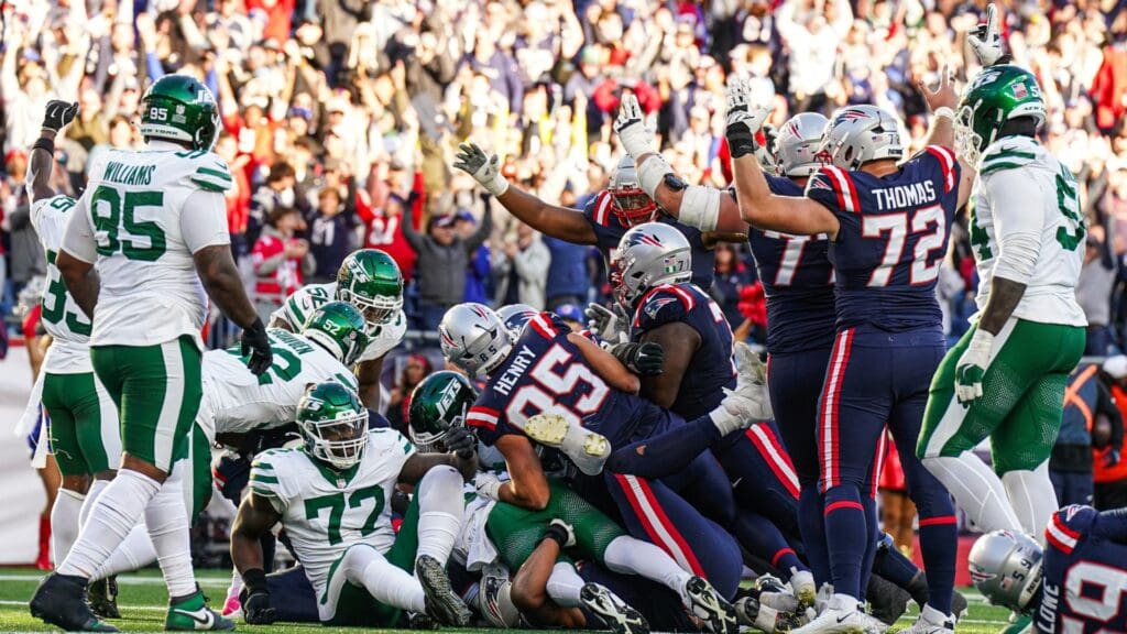 Oct 27, 2024; Foxborough, Massachusetts, USA; The New England Patriots react after a touchdown by running back Rhamondre Stevenson (38) (not pictured) against the New York Jets in the second half at Gillette Stadium