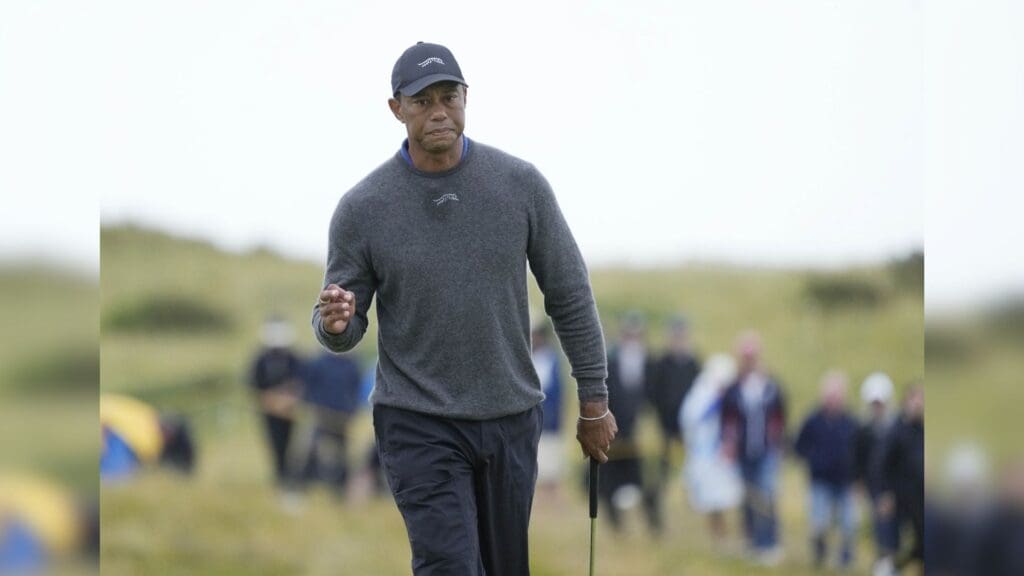 Jul 18, 2024; Ayrshire, SCT; Tiger Woods reacts after putting on the 13th green during the first round of the Open Championship golf tournament at Royal Troon.