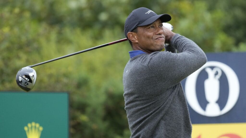 Jul 18, 2024; Ayrshire, SCT; Tiger Woods hits his tee shot on the 12th hole during the first round of the Open Championship golf tournament at Royal Troon.