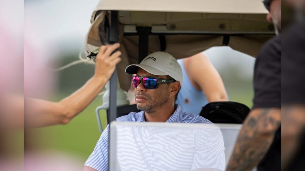 Tiger Woods watches his son, Charlie Woods play during the first round of the108th Amateur Championship at BallenIsles Country Club on June 5, 2025, in Palm Beach Gardens, Florida.