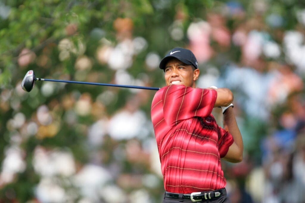 Aug 14, 2005; Springfield, NJ, USA; Tiger Woods tees off on the 13th hole during the final round of the 87th PGA Championship at Baltusrol Golf Club.