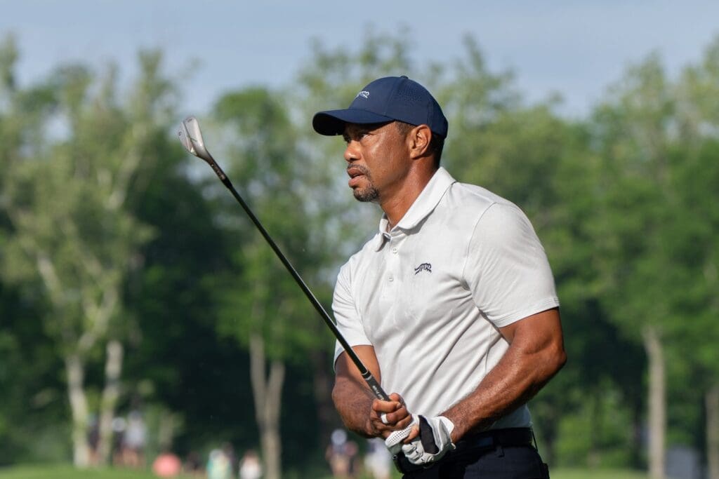 May 13, 2024; Louisville, Kentucky, USA; Tiger Woods hits off the fairway on hole 10 during a practice round for the PGA Championship golf tournament at Valhalla Golf Club.