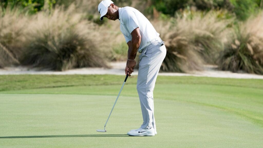 December 1, 2017; New Providence, The Bahamas; Tiger Woods putts on the 14th hole during the second round of the Hero World Challenge golf tournament at Albany.