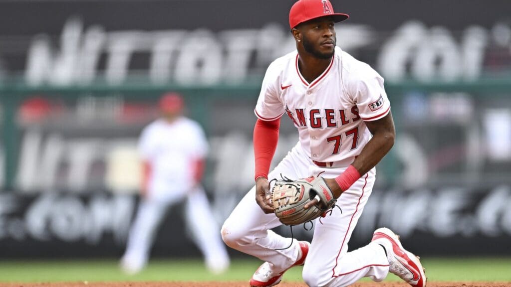 May 4, 2025; Anaheim, California, USA; Los Angeles Angels second baseman Tim Anderson (77) looks to throw the ball against the Detroit Tigers during the fourth inning at Angel Stadium.