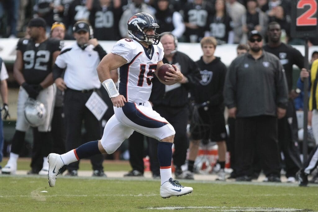 ov 6, 2011; Oakland CA, USA; Denver Broncos quarterback Tim Tebow (15) elects to run during the first quarter against the Oakland Raiders at O.co Coliseum