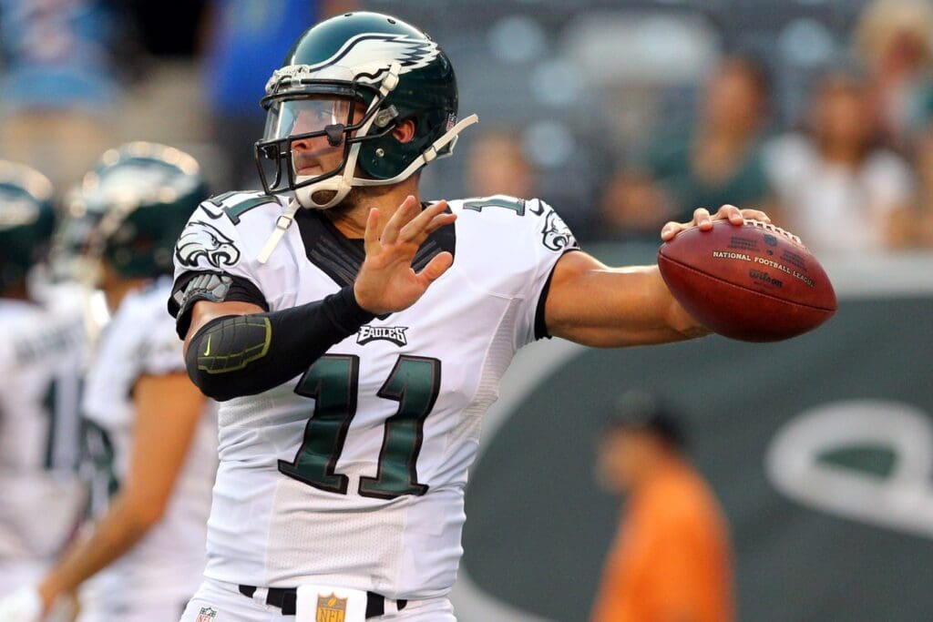 Sep 3, 2015; East Rutherford, NJ, USA; Philadelphia Eagles quarterback Tim Tebow (11) throws a pass before a game against the New York Jets at MetLife Stadium.