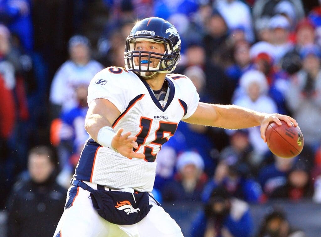 Dec 24, 2011; Orchard Park, NY, USA; Denver Broncos quarterback Tim Tebow (15) passes against the Buffalo Bills during the second half at Ralph Wilson Stadium. Bills beat the Broncos 40-14.