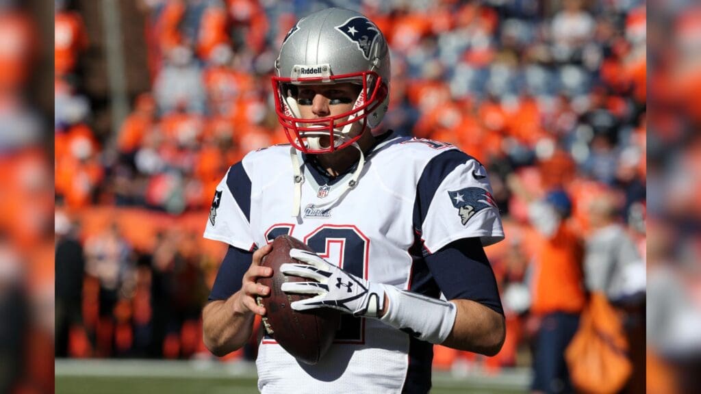 Jan 19, 2014; Denver, CO, USA; New England Patriots quarterback Tom Brady (12) before the 2013 AFC championship playoff football game against the Denver Broncos at Sports Authority Field at Mile High.