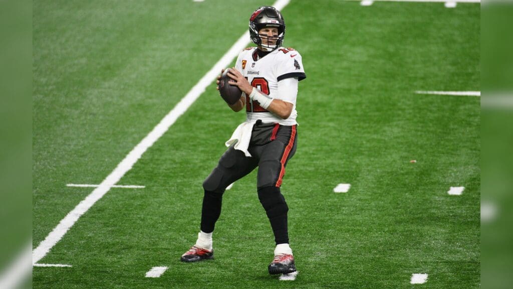 Dec 26, 2020; Detroit, Michigan, USA; Tampa Bay Buccaneers quarterback Tom Brady (12) drops back to pass during the second quarter against the Detroit Lions at Ford Field.