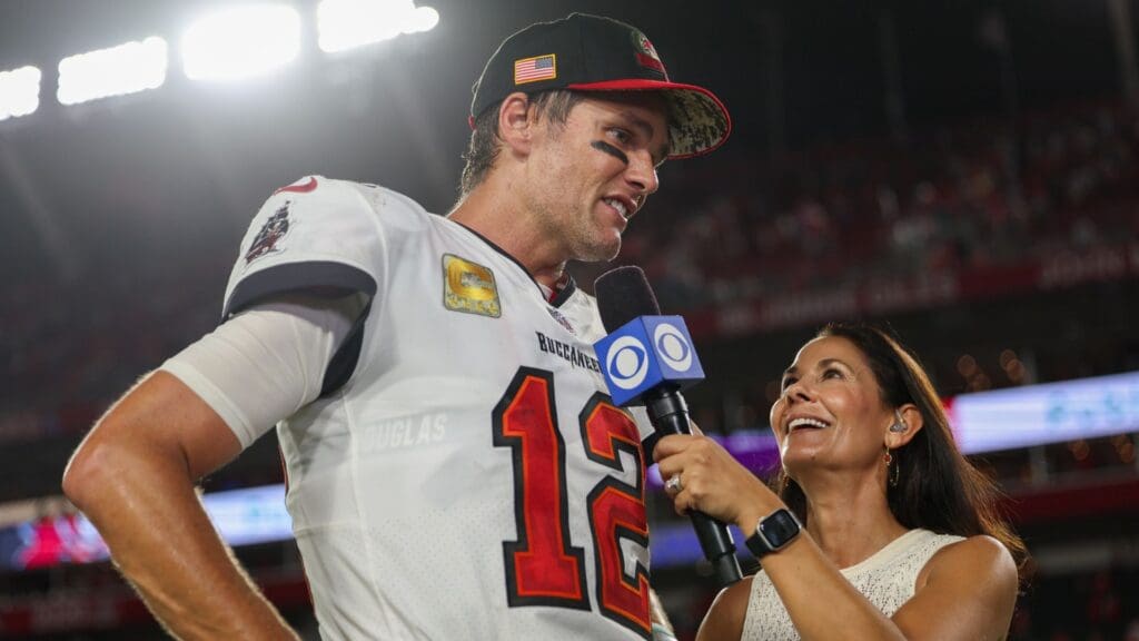 Nov 6, 2022; Tampa, Florida, USA; Tampa Bay Buccaneers quarterback Tom Brady (12) speaks to CBS sideline reporter Tracy Wolfson anger beating the Los Angeles Rams at Raymond James Stadium.