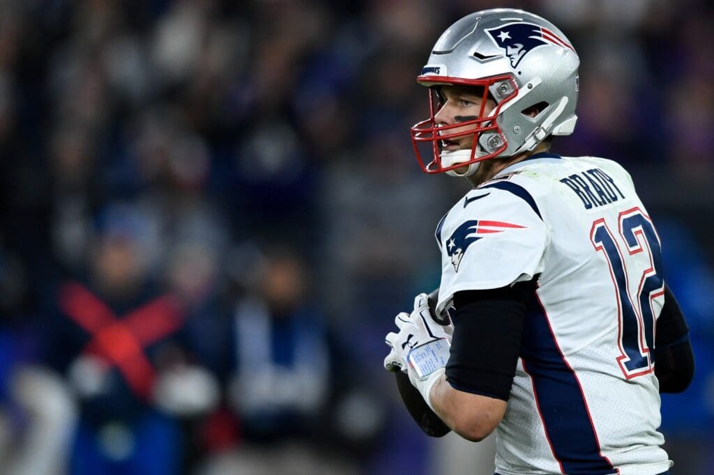 Nov 3, 2019; Baltimore, MD, USA; New England Patriots quarterback Tom Brady (12) looks to pass during the fourth quarter against the Baltimore Ravens at M&T Bank Stadium.