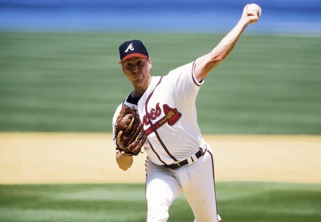 1996, Atlanta, GA, USA; FILE PHOTO; Atlanta Braves pitcher Tom Glavine in action on the mound at Fulton County Stadium during the 1996 season.