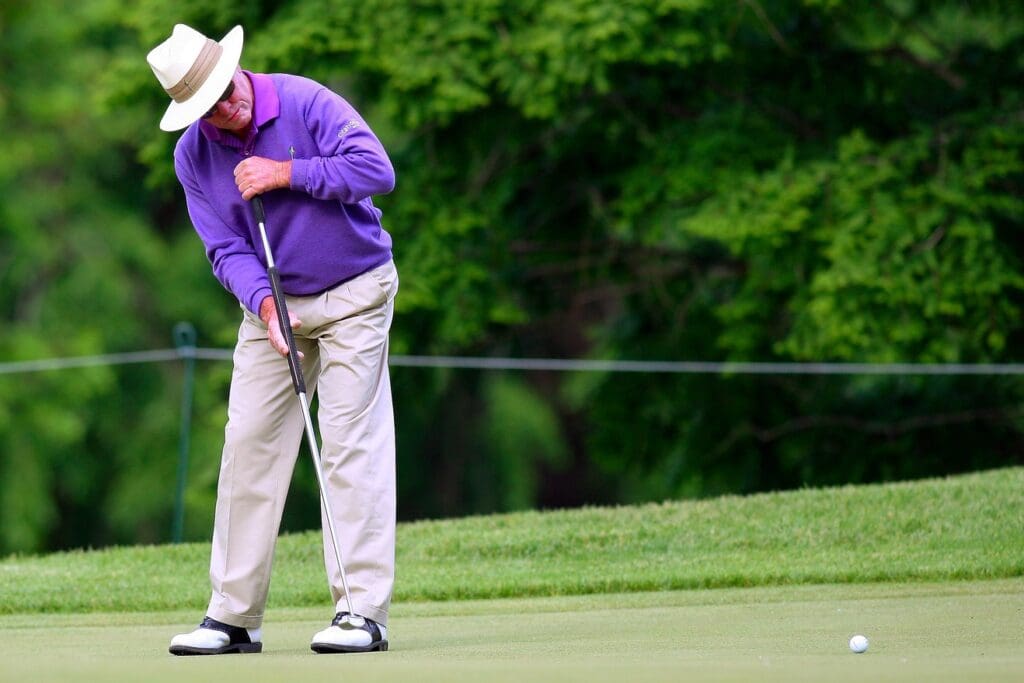 May 23, 2013; St. Louis, MO, USA; Tom Kite putts on the 1st green during first round of the 74th Senior PGA Championship at Bellerive Country Club. 