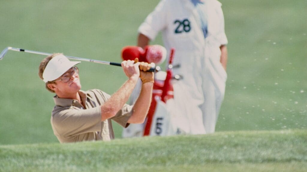 04/11/1985; Augusta, Georgia, USA; Tom Kite chips ball out of bunker at the Augusta National Golf Course during the 1985 Masters.