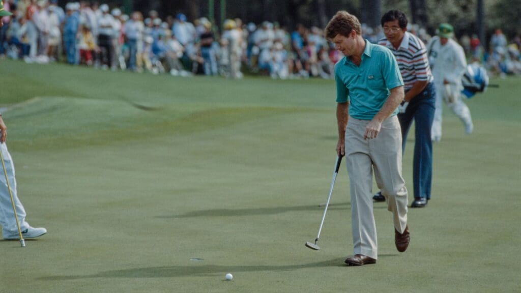 04/11/1985; Augusta, Georgia, USA; Tom Watson walks to ball to putt with Tsuneyuki Nakajima in the background at the Augusta National Golf Course during the 1985 Masters.