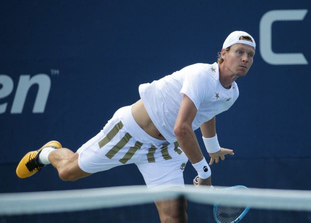 Aug 26, 2019; Flushing, NY, USA; Tomas Berdych of Czech Republic serves against Jenson Brooksby of the United States in a first round match on day one of the 2019 U.S. Open tennis tournament at USTA Billie Jean King National Tennis Center.