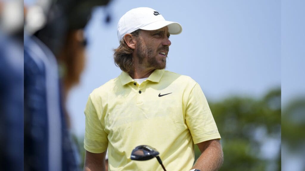 Jun 1, 2025; Dublin, Ohio, USA; Tommy Fleetwood watches his shot from the first tee during the final round of the Memorial Tournament presented by Workday golf tournament.