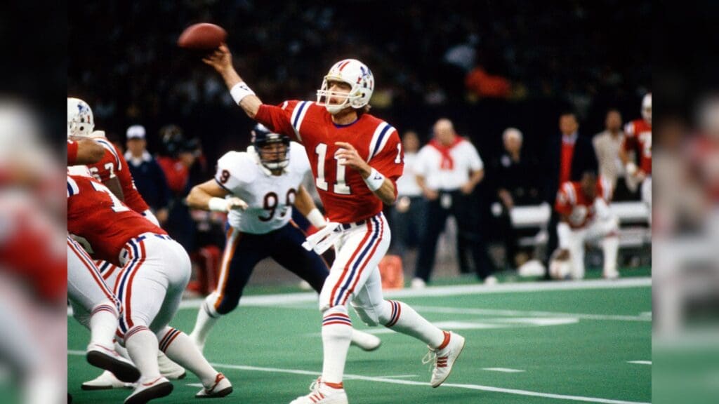 Jan 26, 1986; New Orleans, LA, USA; FILE PHOTO; New England Patriots quarterback (11) Tony Eason in action against the Chicago Bears in Super Bowl XX at the Superdome. The Bears defeated the Patriots 46-10.