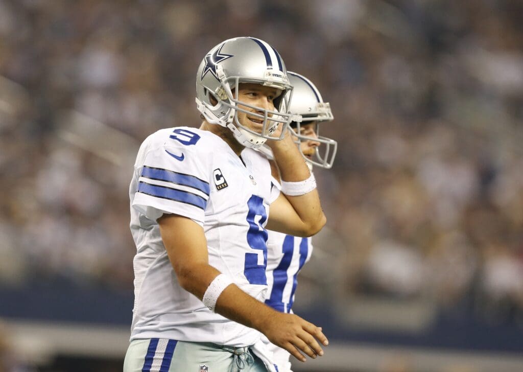 Sep 28, 2014; Arlington, TX, USA; Dallas Cowboys quarterback Tony Romo (9) leaves the field after a three and out by the offense against the New Orleans Saints at AT&T Stadium.