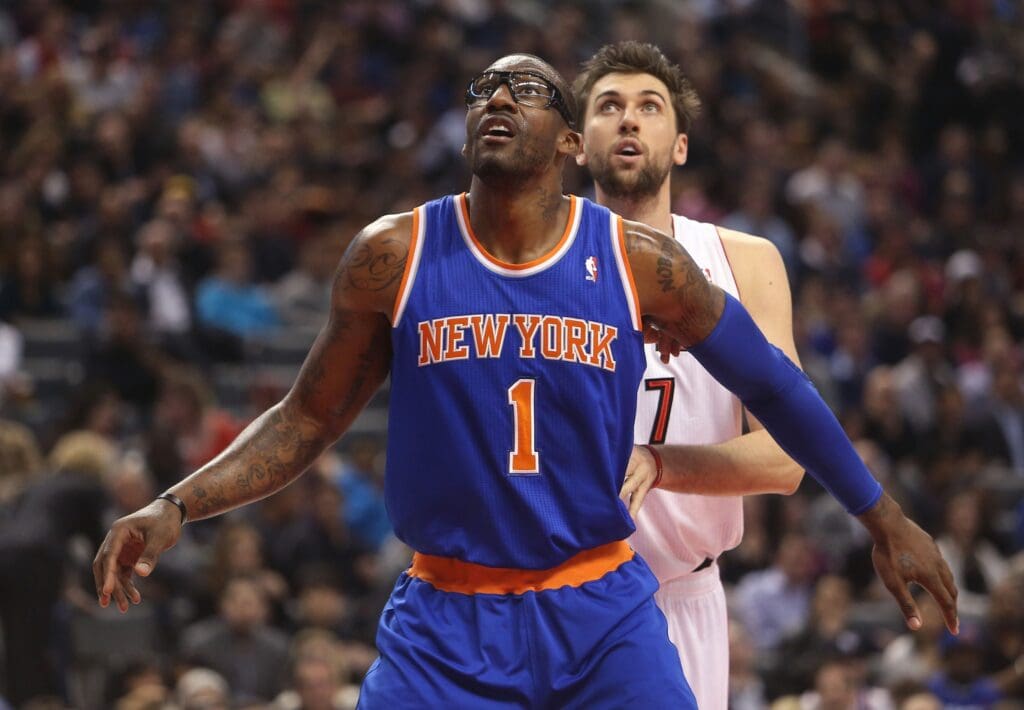 Feb 22, 2013; Toronto, ON, Canada; New York Knicks forward Amar'e Stoudemire (7) positions himself for a rebound against Toronto Raptors center Andrea Bargnani (7) at the Air Canada Centre. The Raptors beat the Knicks 100-98.