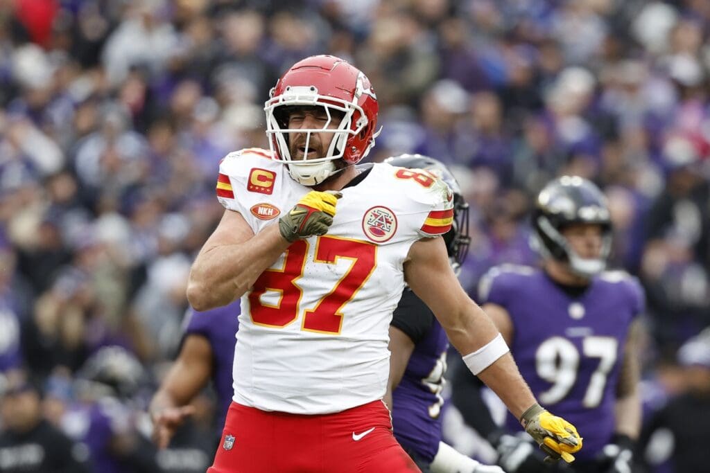 Jan 28, 2024; Baltimore, Maryland, USA; Kansas City Chiefs tight end Travis Kelce (87) celebrates after scoring a touchdown against the Baltimore Ravens during the first half in the AFC Championship football game at M&T Bank Stadium.