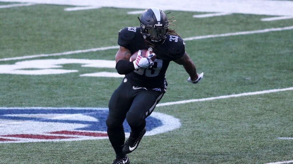Feb 24, 2019; Atlanta, GA, USA; Birmingham Iron running back Trent Richardson (33) runs the ball against the Atlanta Legends in the second half at Georgia State Stadium.