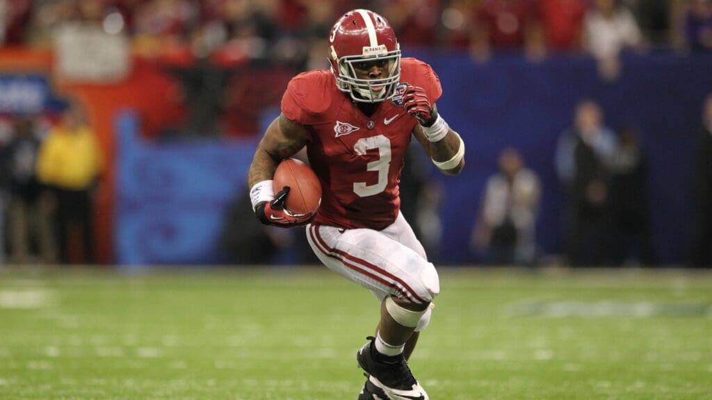 Jan 9, 2012; New Orleans, LA, USA; Alabama Crimson Tide running back Trent Richardson (3) carries the ball for a touchdown in the fourth quarter against the LSU Tigers in the 2012 BCS National Championship game at the Mercedes-Benz Superdome.