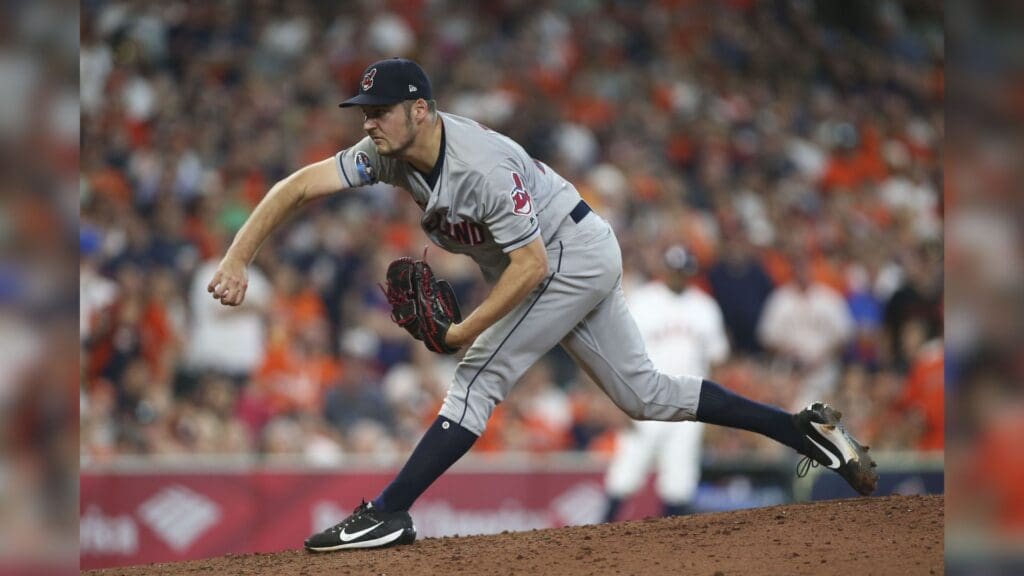 Oct 5, 2018; Houston, TX, USA; Cleveland Indians pitcher Trevor Bauer (47) delivers a pitch during the seventh inning in game one of the 2018 ALDS playoff baseball series against the Houston Astros at Minute Maid Park.