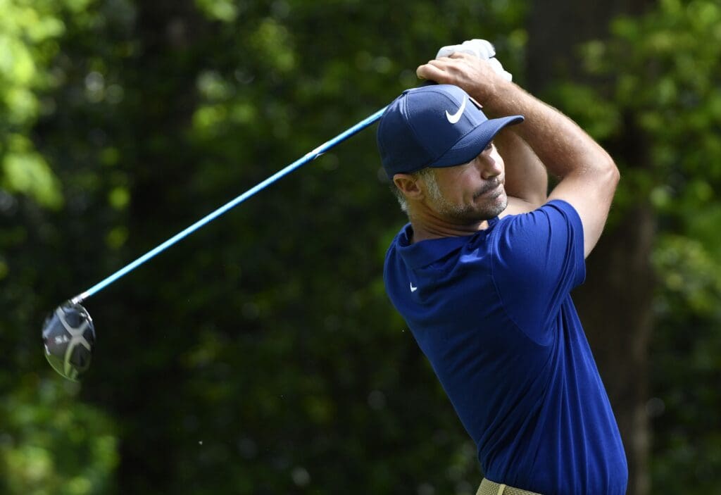 Apr 11, 2019; Augusta, GA, USA; Trevor Immelman hits his tee shot on the 2nd hole during the first round of The Masters golf tournament at Augusta National Golf Club.