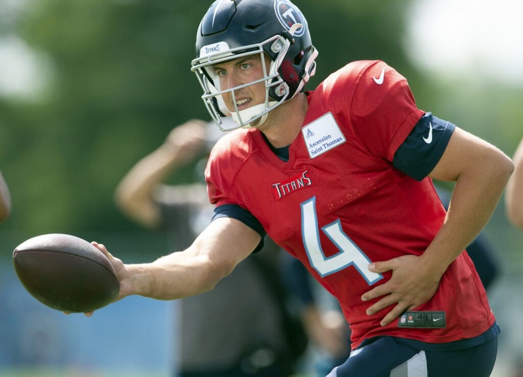 Aug 20, 2020; Nashville, TN, USA; Tennessee Titans quarterback Trevor Siemian (4) hands the ball off during a training camp practice at Saint Thomas Sports Park Thursday, Aug. 20, 2020 in Nashville, Tenn.