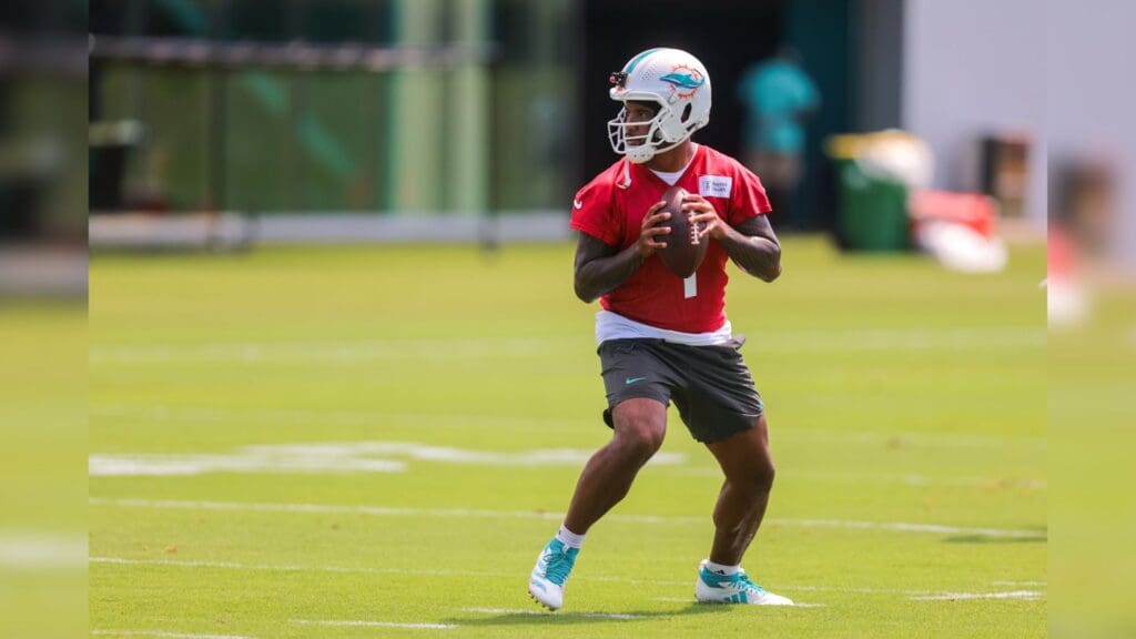 Jun 10, 2025; Miami, FL, USA; Miami Dolphins quarterback Tua Tagovailoa (1) looks for a passing option during mandatory minicamp at Hard Rock Stadium.