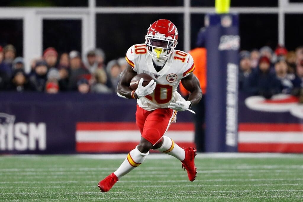 Dec 8, 2019; Foxborough, MA, USA; Kansas City Chiefs wide receiver Tyreek Hill (10) runs against the New England Patriots during the first quarter at Gillette Stadium