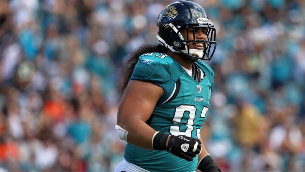 November 21, 2010; Jacksonville FL, USA; Jacksonville Jaguars defensive tackle Tyson Alualu (93) reacts after he sacked Cleveland Browns quarterback Colt McCoy (not pictured) during the first half of their game at Jacksonville EverBank Field.