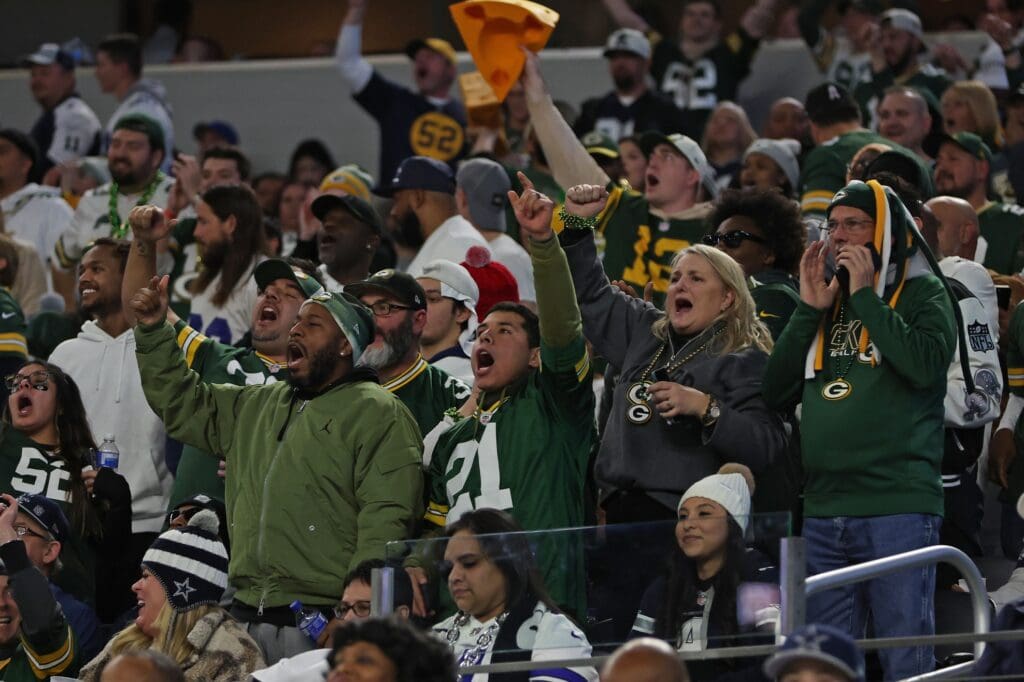 Jan 14, 2024; Arlington, Texas, USA; Green Bay Packers fans react against the Dallas Cowboys during the second half for the 2024 NFC wild card game at AT&T Stadium