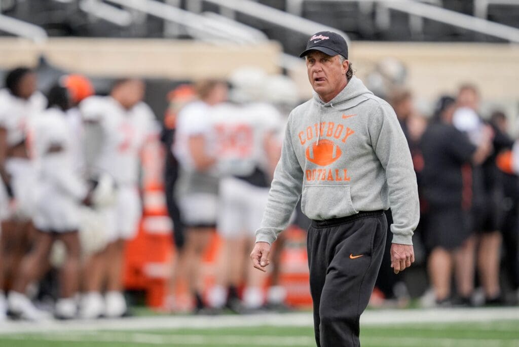 Head coach Mike Gundy walks on the field during an Oklahoma State spring football showcase at Boone Pickens Stadium in Stillwater, Okla., Saturday, April 19, 2025.