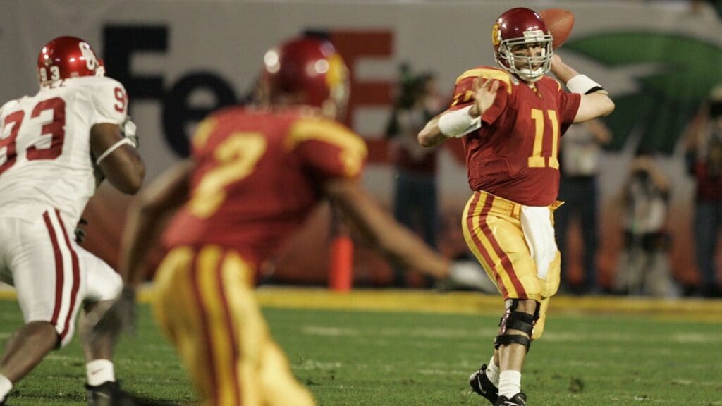 USC Trojans quarterback Matt Leinart in action during the 2005 Orange Bowl against the Oklahoma Sooners . Leinart, who threw 5 touchdowns, was named the game's MVP.