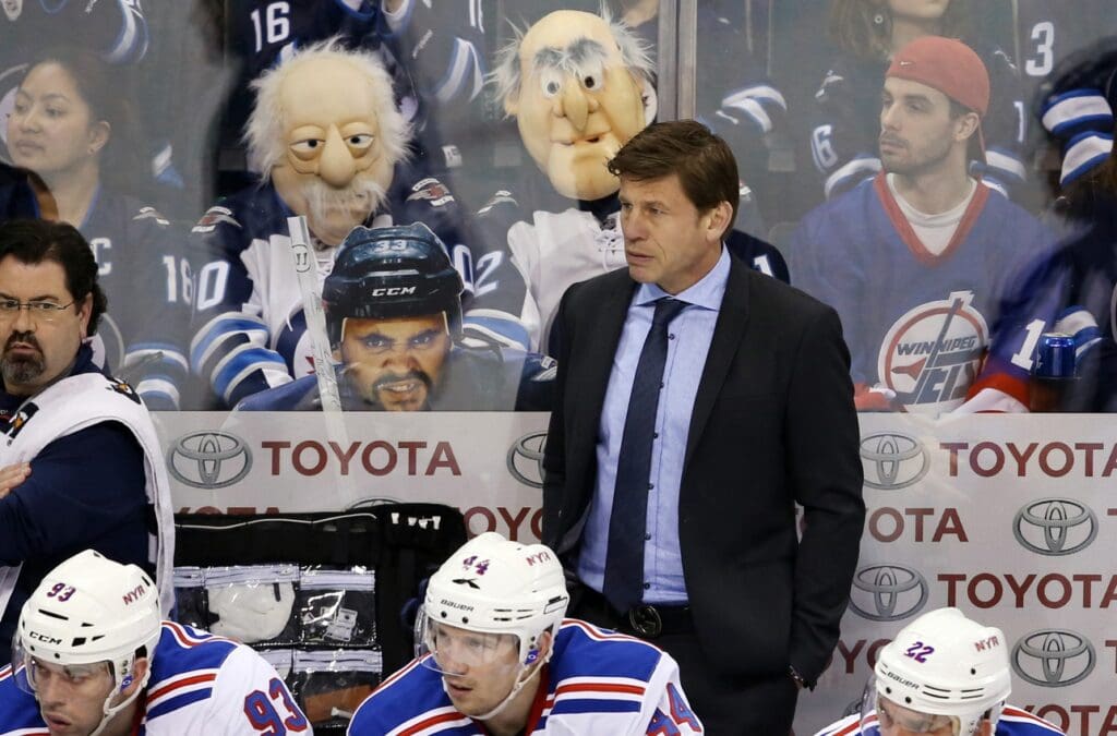Mar 31, 2015; Winnipeg, Manitoba, CAN; New York Rangers assistant coach Ulf Samuelsson reacts during the first period against the Winnipeg Jets at MTS Centre.