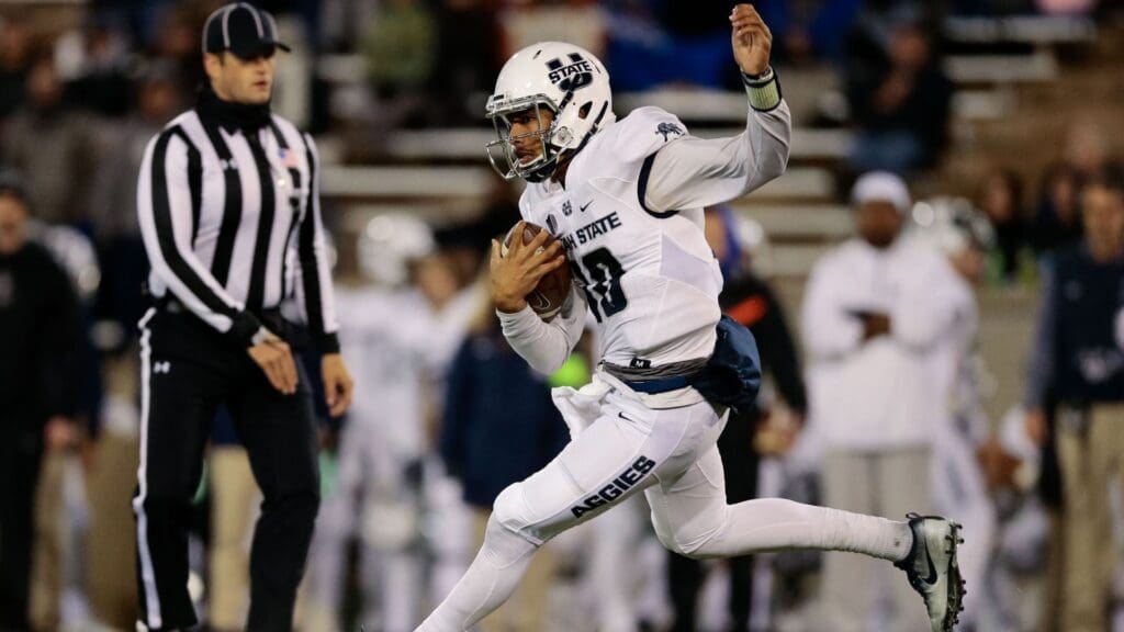 Nov 25, 2017; Colorado Springs, CO, USA; Utah State Aggies quarterback Jordan Love (10) runs the ball in the first quarter against the Air Force Falcons at Falcon Stadium.