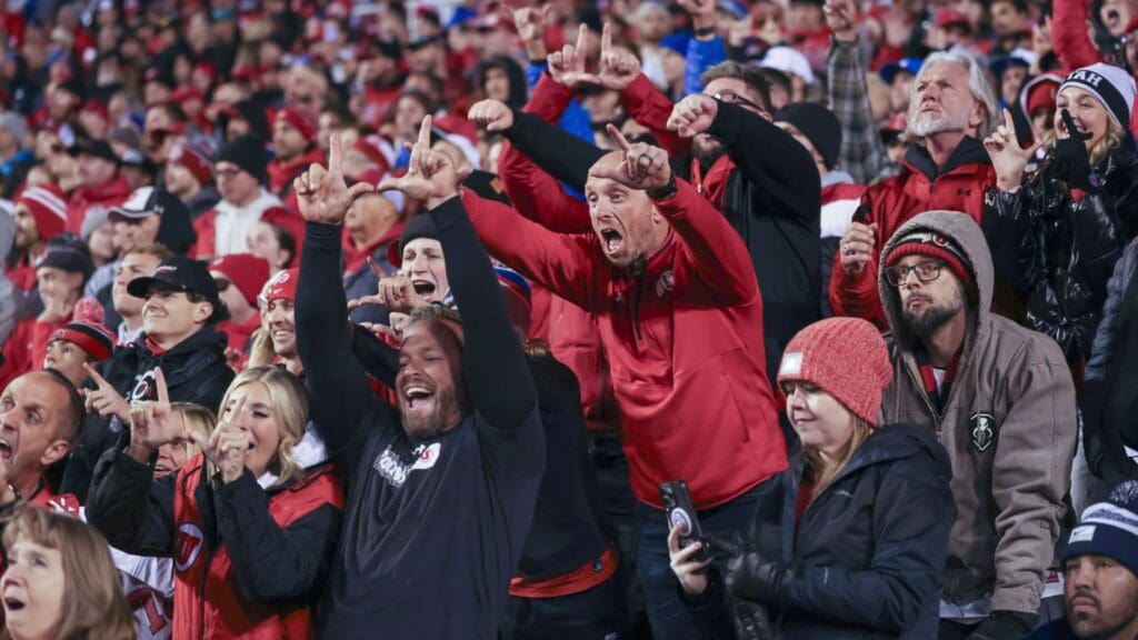 Utah Utes fans react after a play against the Brigham Young Cougars during the second quarter at Rice-Eccles Stadium.