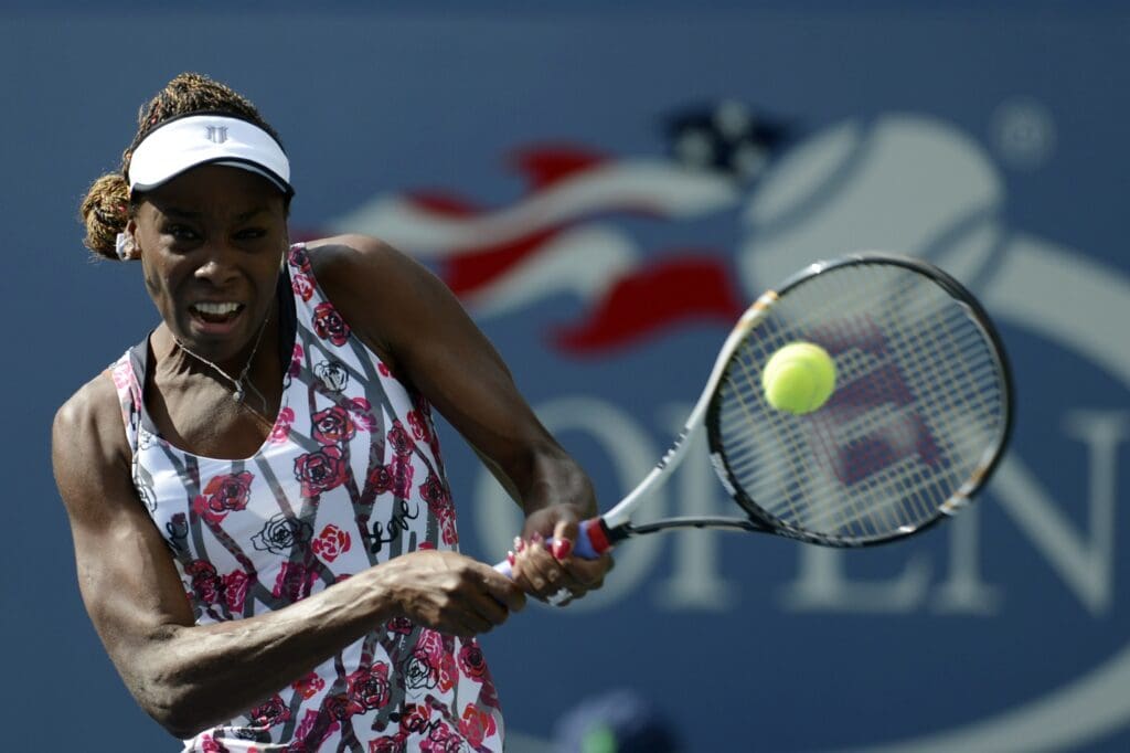 Aug 28, 2012; Queens, NY, USA; Venus Williams (USA) returns a shot against Bethanie Mattek-Sands (USA) on day two of the 2012 US Open at Billie Jean King National Tennis Center.