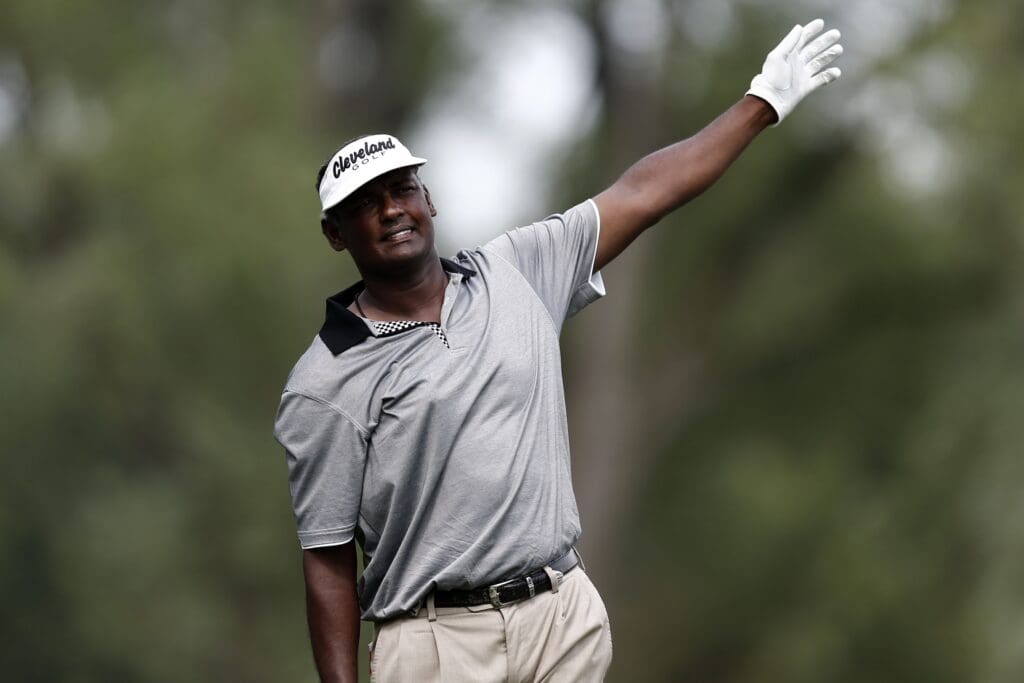 Aug 8, 2013; Rochester, NY, USA; Vijay Singh reacts to his shot on the 9th hole during the first round of the 95th PGA Championship at Oak Hill Country Club.