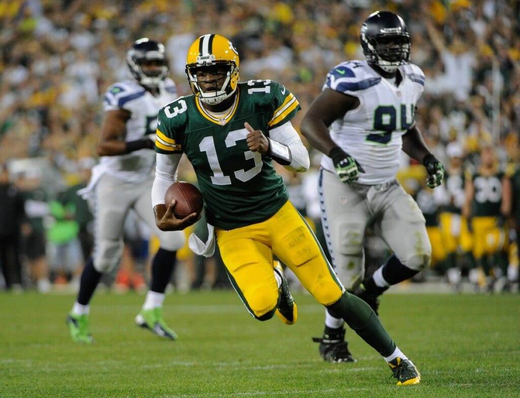 Aug 23, 2013; Green Bay, WI, USA; Green Bay Packers quarterback Vince Young (13) during the game against the Seattle Seahawks at Lambeau Field.