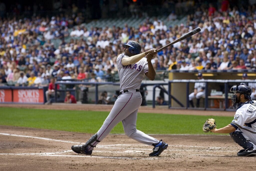 June 13, 2010; Milwaukee, WI, USA; Texas Rangers right fielder Vladimir Guerrero (27) bats during the game against the Milwaukee Brewers at Miller Park. The Rangers defeated the Brewers 7-2.