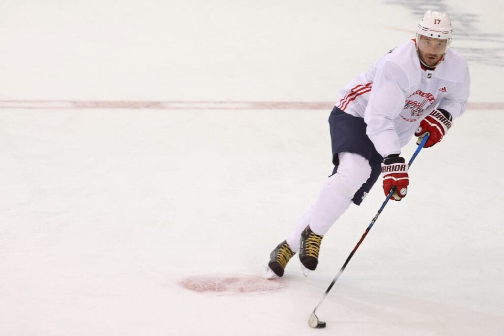 Jul 15, 2020; Arlington, Virginia, USA; Washington Capitals left wing Ilya Kovalchuk (17) skates with the puck during an NHL workout at MedStar Capitals Iceplex.