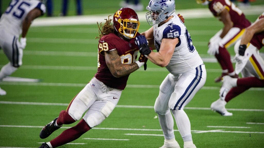 Nov 26, 2020; Arlington, Texas, USA; Washington Football Team defensive end Chase Young (99) and Dallas Cowboys offensive tackle Brandon Knight (69) in action during the game between the Dallas Cowboys and the Washington Football Team at AT&T Stadium.