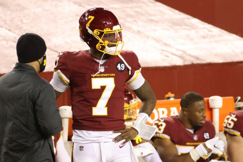 Dec 27, 2020; Landover, Maryland, USA; Washington Football Team quarterback Dwayne Haskins (7) stands on the sidelines after being benched against the Carolina Panthers in the fourth quarter at FedExField.