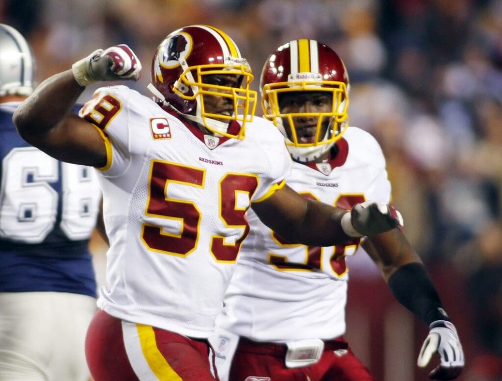 December 27, 2009; Landover, MD, USA; Washington Redskins linebacker London Fletcher (59) celebrates a defensive stop against the Dallas Cowboys at FedEx Field. The Cowboys won 17-0.